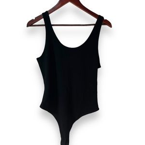 Jo & Co black one piece body suit snap closure and thong back size large